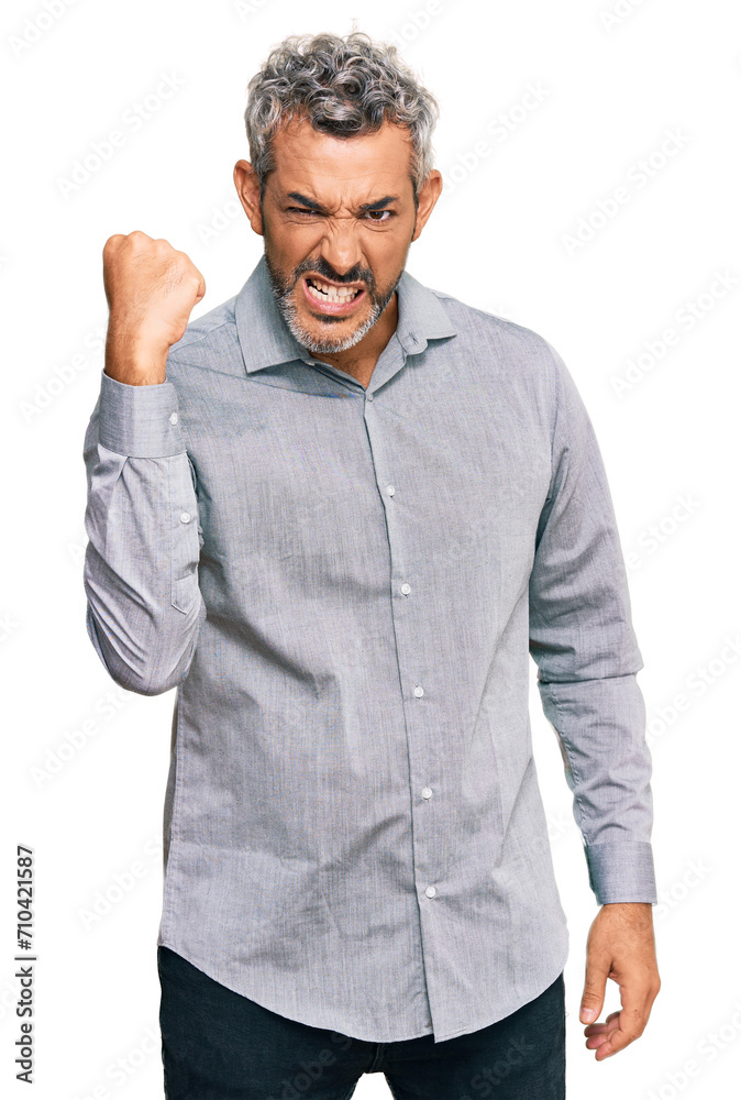 Poster middle age grey-haired man wearing casual clothes angry and mad raising fist frustrated and furious 