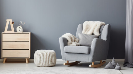 Comfortable armchair near light grey wall indoors.