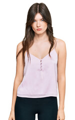 Fototapeta premium Young beautiful caucasian girl wearing casual clothes skeptic and nervous, frowning upset because of problem. negative person.