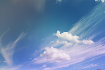 Beautiful sunset sky above clouds with dramatic light. Cabin view from airplane