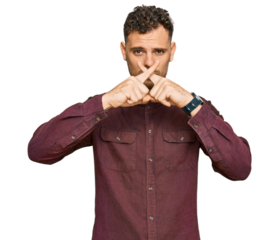 Young hispanic man wearing casual clothes rejection expression crossing fingers doing negative sign