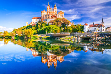 Melk Abbey, Austria. Stift Melk reflected in the water of Danube River, scenic Wachau Valley.