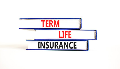 Term life insurance symbol. Concept words Term life insurance on beautiful books. Beautiful white...