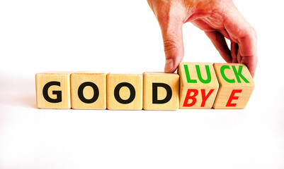 Good luck or goodbye symbol. Concept words Good luck or Goodbye on beautiful wooden blocks....
