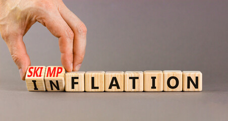 Inflation or skimpflation symbol. Concept words Inflation Skimpflation on beautiful wooden blocks....