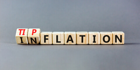 Inflation or tipflation symbol. Concept words Inflation Tipflation on beautiful wooden blocks....