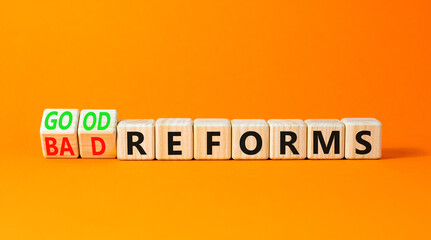 Good or bad reforms symbol. Concept words Good reforms Bad reforms on beautiful wooden blocks. Beautiful orange table orange background. Business good bad reforms concept. Copy space