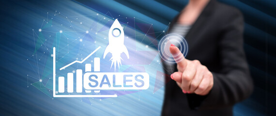 Woman touching a sales growth concept