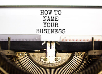 How to name your business symbol. Concept words How to name your business typed on beautiful old retro typewriter. Beautiful white background. How to name your business concept. Copy space.