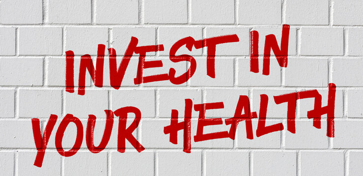  Graffiti on a brick wall - Invest in your health