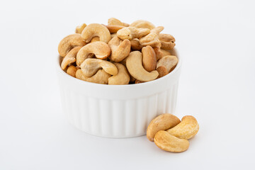 Dried cashew nuts. Macro shot. Raw snack. Pile cashew nuts without shell. Whole nut kernels	
