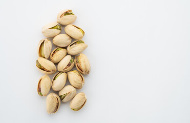 Salted Pistachios for Beer, Macro, Spin. Isolated Background of a Beer Snack of Salted Pistachio Nuts. Healthy Delicious Pistachios. Salted roasted pistachio macro	