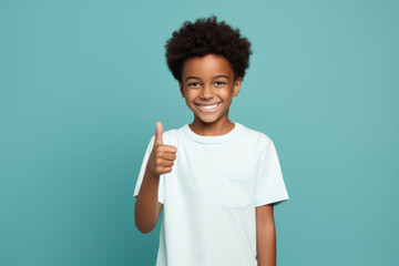 Joyful Child Showing Approval with Thumbs Up - obrazy, fototapety, plakaty