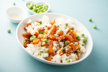 Rice bowl with carrot and pea