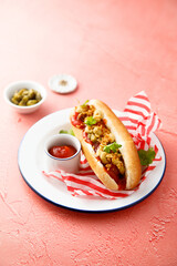 Traditional hot dog with pickles