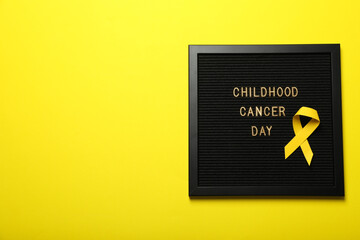 Black board with the inscription Childhood Cancer Day