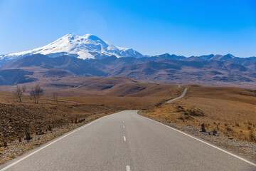 asphalt road to the beautiful Mount Elbrus