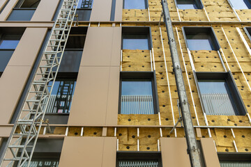 Façade en cours de finition, isolation extérieure 