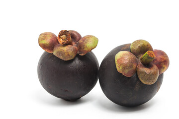 Two fresh organic mangosteen delicious fruit side view isolated on white background clipping path