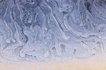 Fluid soap bubble psychedelic colorful abstract art. Surreal patterns with rainbows and waves of color in motion.