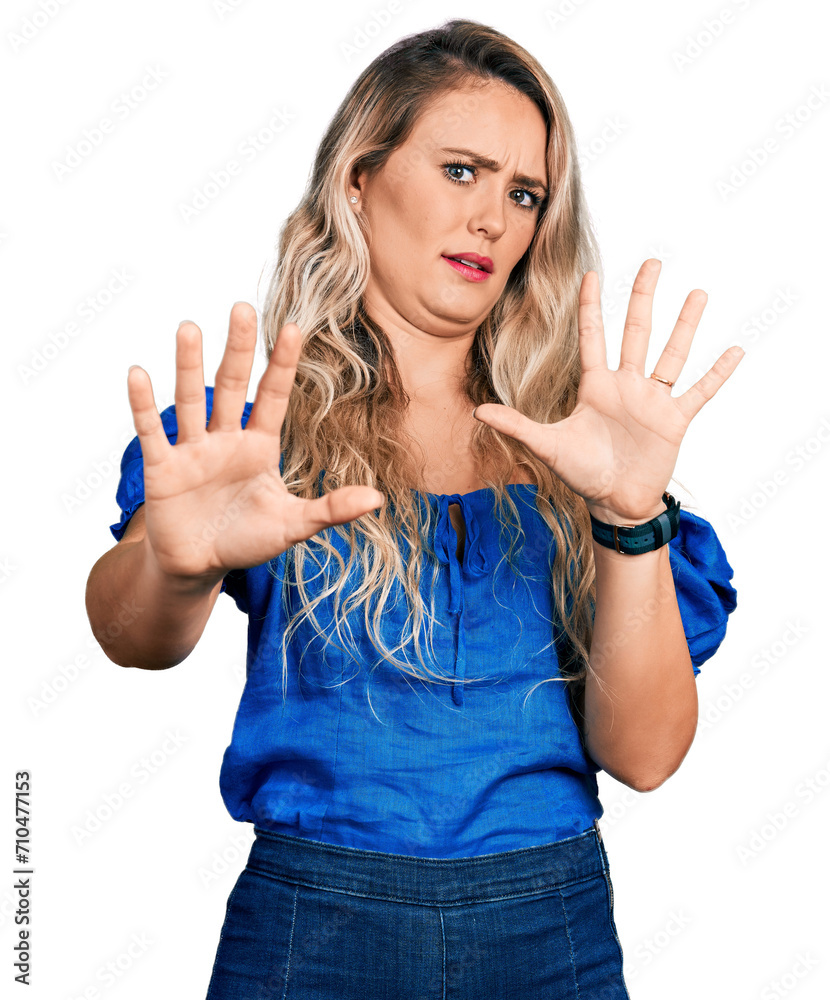 Canvas Prints young blonde woman wearing casual clothes doing stop gesture with hands palms, angry and frustration