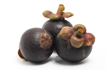 Three fresh organic mangosteen delicious fruit isolated on white background clipping path