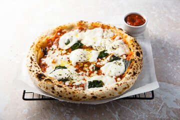 Traditional homemade pizza with tomato sauce and cheese