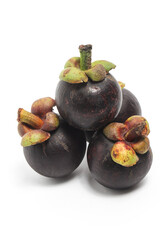 Four fresh organic mangosteen delicious fruit isolated on white background clipping path