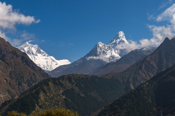 View of Lhotse and Ama Dablam mountains during trekking in Nepal in a clear day. EBC Everest Base Camp or Three passes trek in Nepal. Mountain range Himalayas in the Khumbu region of Nepal, Asia.
