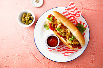 Traditional hot dog with pickles