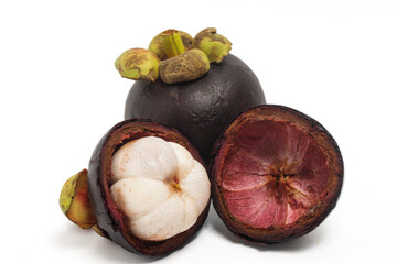 Half cut sliced and whole fresh organic mangosteen delicious fruit with peel isolated on white background clipping path