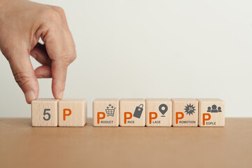 5Ps, Product, Price, Place, Promotion and People text on wooden cube blocks with icons  including copy space for marketing strategy concept