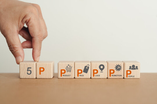 5Ps, Product, Price, Place, Promotion and People text on wooden cube blocks with icons  including copy space for marketing strategy concept