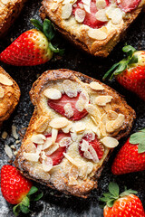Bostock a French pastry made of sliced brioche with frangipane cream, strawberries and almond...