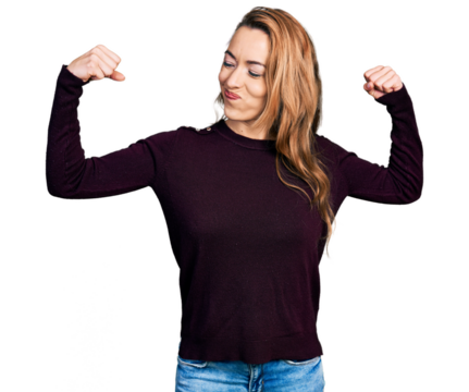 Young caucasian woman wearing casual clothes showing arms muscles smiling proud. fitness concept. - Powered by Adobe
