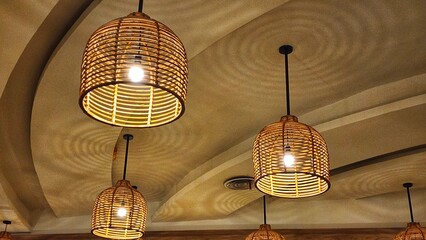 Ceiling lamps in a cafe, close up of photo.