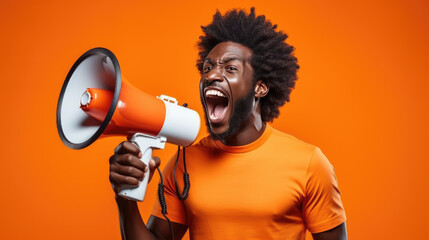 Man is shouting into a megaphone - obrazy, fototapety, plakaty