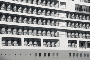 Lines of cabins and balconies of big cruse liner. Close up, side view. Kushadasi, Turkey