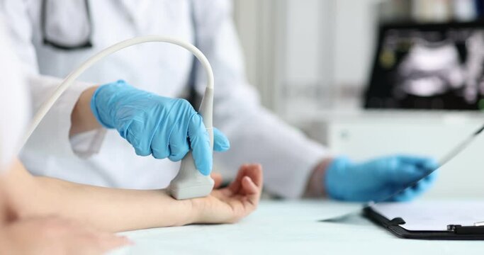 Ultrasound of tendon on arm. Ultrasound of wrist and hand joints concept