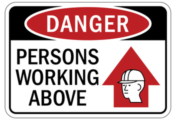 Men working above warning sign and labels