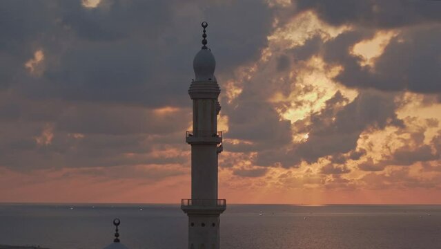 Minaret at cloudy sunset (Al-Hasayna mosque at Gaza City, 2021)