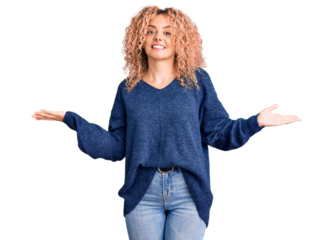 Young blonde woman with curly hair wearing casual winter sweater smiling showing both hands open palms, presenting and advertising comparison and balance