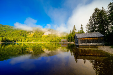 Fototapeta premium View of the surrounding landscape at Ödensee in Bad Mitterndorf in Styria. Nature at the clear swimming lake in the Salzkammergut in Austria. 