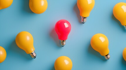 Une ampoule rouge différenciée des ampoules jaune pour représenter la discrimination ou la différence