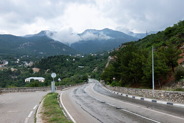 European Highway with markings in the mountains leading to the sea at dawn. Coast of the Black Sea.