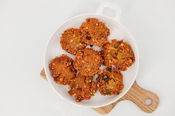 Crispy fried lentil fritters,Parippu ,dal, paripu vada. savoury fried snack also called dal vada, vadai or Masala vada  popular Indian street food and a tea time snack, called Paruppu Vadai