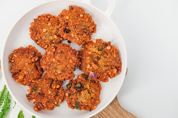 Crispy fried lentil fritters,Parippu ,dal, paripu vada. savoury fried snack also called dal vada, vadai or Masala vada  popular Indian street food and a tea time snack, called Paruppu Vadai