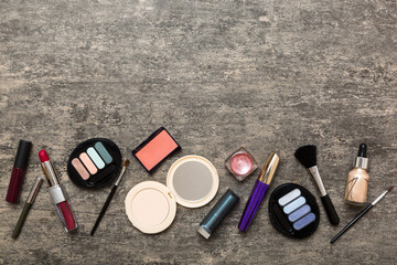 Professional makeup tools. Top view. Flat lay. Beauty, decorative cosmetics. Makeup brushes set and...