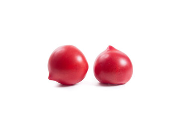 Two pink tomatoes isolated on white background.