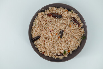 Tamarind Rice/  Puliyodharai / Puliyogare - Tangy and spicy South Indian rice dish as break fast , Lunch or dinner. Tamarind as main ingredient and other spices. Famous Tamilnadu dish.